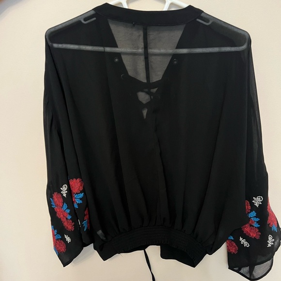 Black sheer top with flower embroidered sleeves - Picture 2 of 2